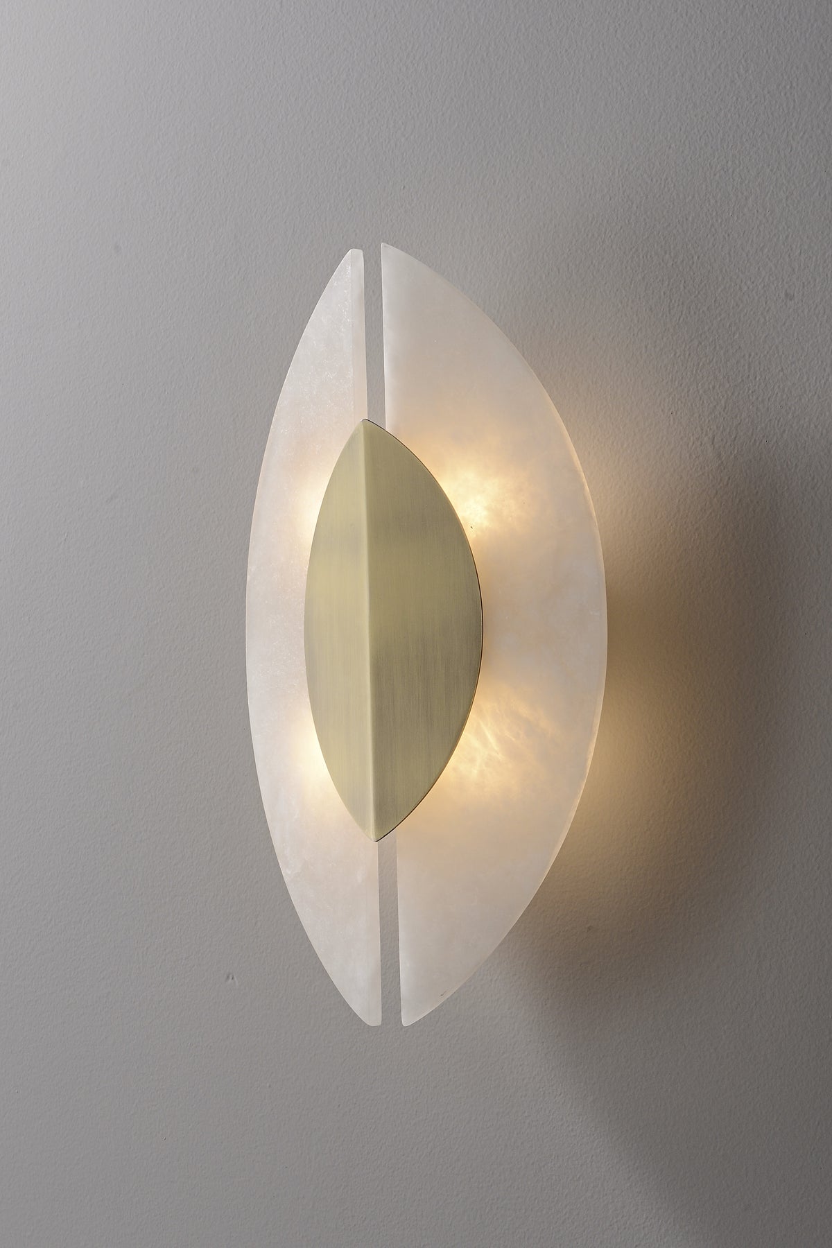 Modern Alabaster Leaf Wall Sconce in Antique Brass - 06 06-real-glow-angle