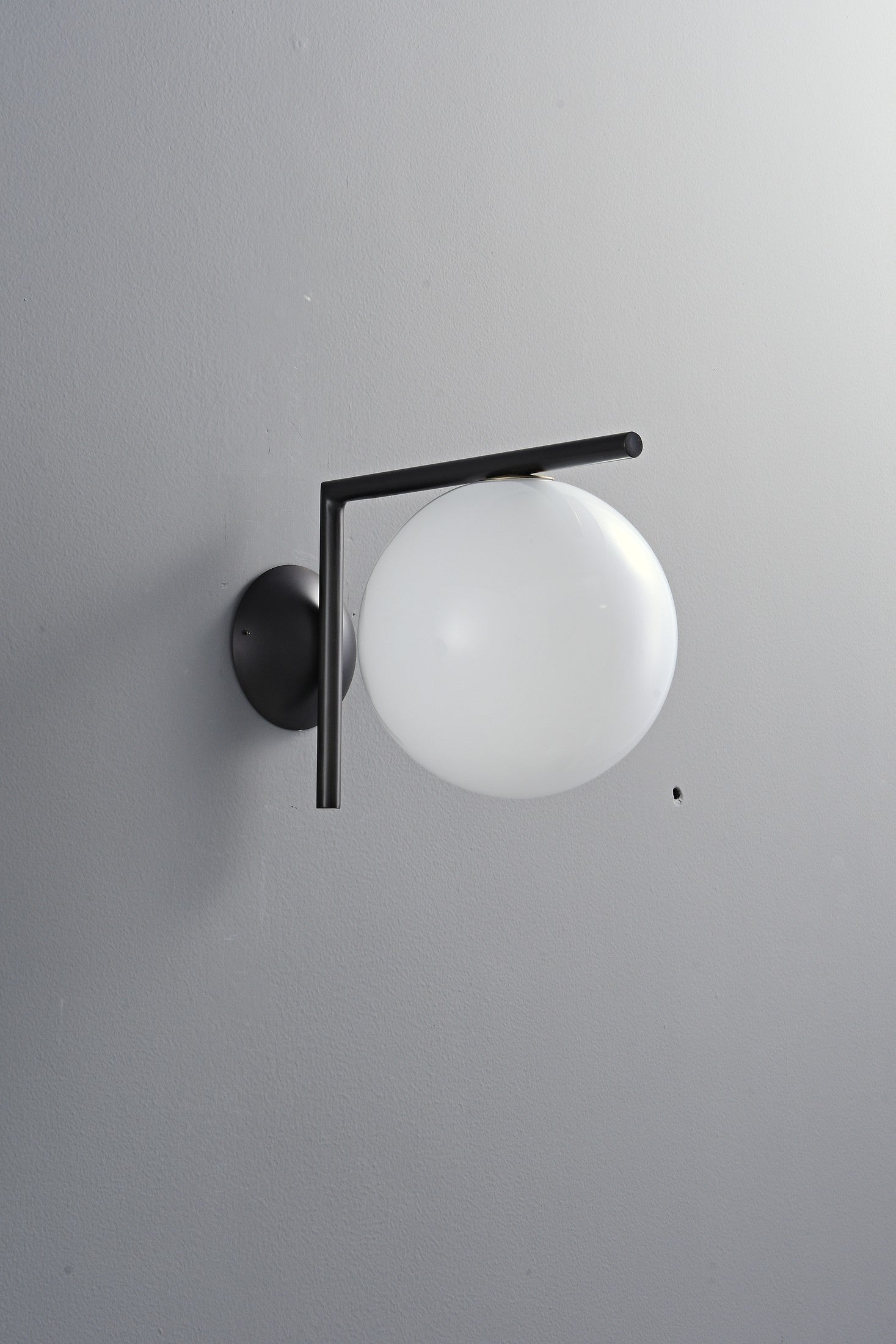Modern Globe Arm Wall Sconce - 06 06-real-shot-black-globe-arm-wall-sconce-unlit