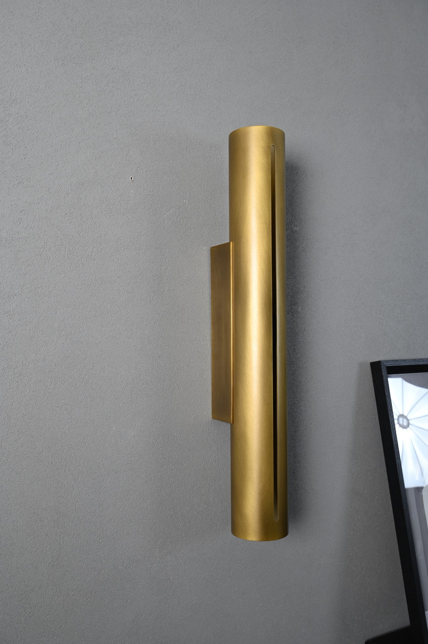 Modern Brass Cylinder LED Wall Sconce in Red Antique Brass - 06 06-real-shot-cylinder-led-wall-sconce-lit
