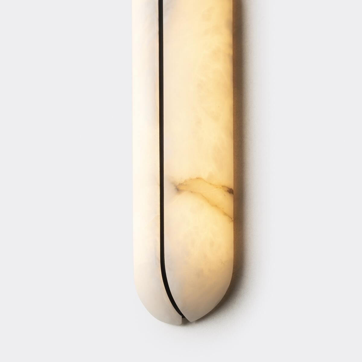 Real small alabaster capsule wall sconce material detail