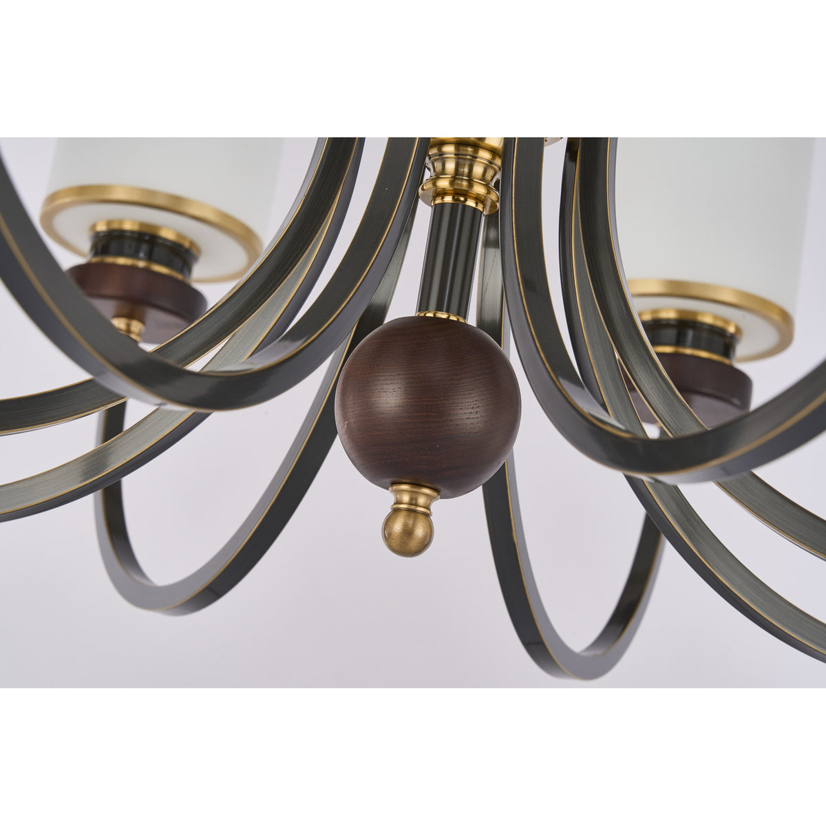 Supplier real detail photograph of the Ashbourne brass lower hub, blackened arms and ash-wood drop