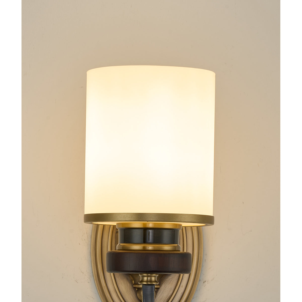 Supplier real detail photograph of the Ashbourne illuminated opal shade and brass-rimmed collar