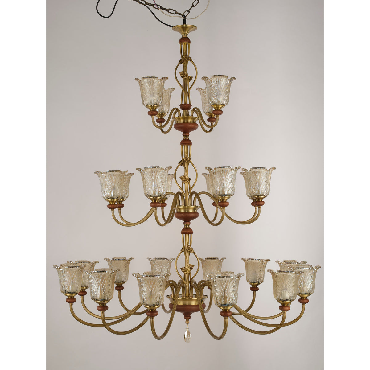 Real product photograph of the twenty-four-light three-tier chandelier