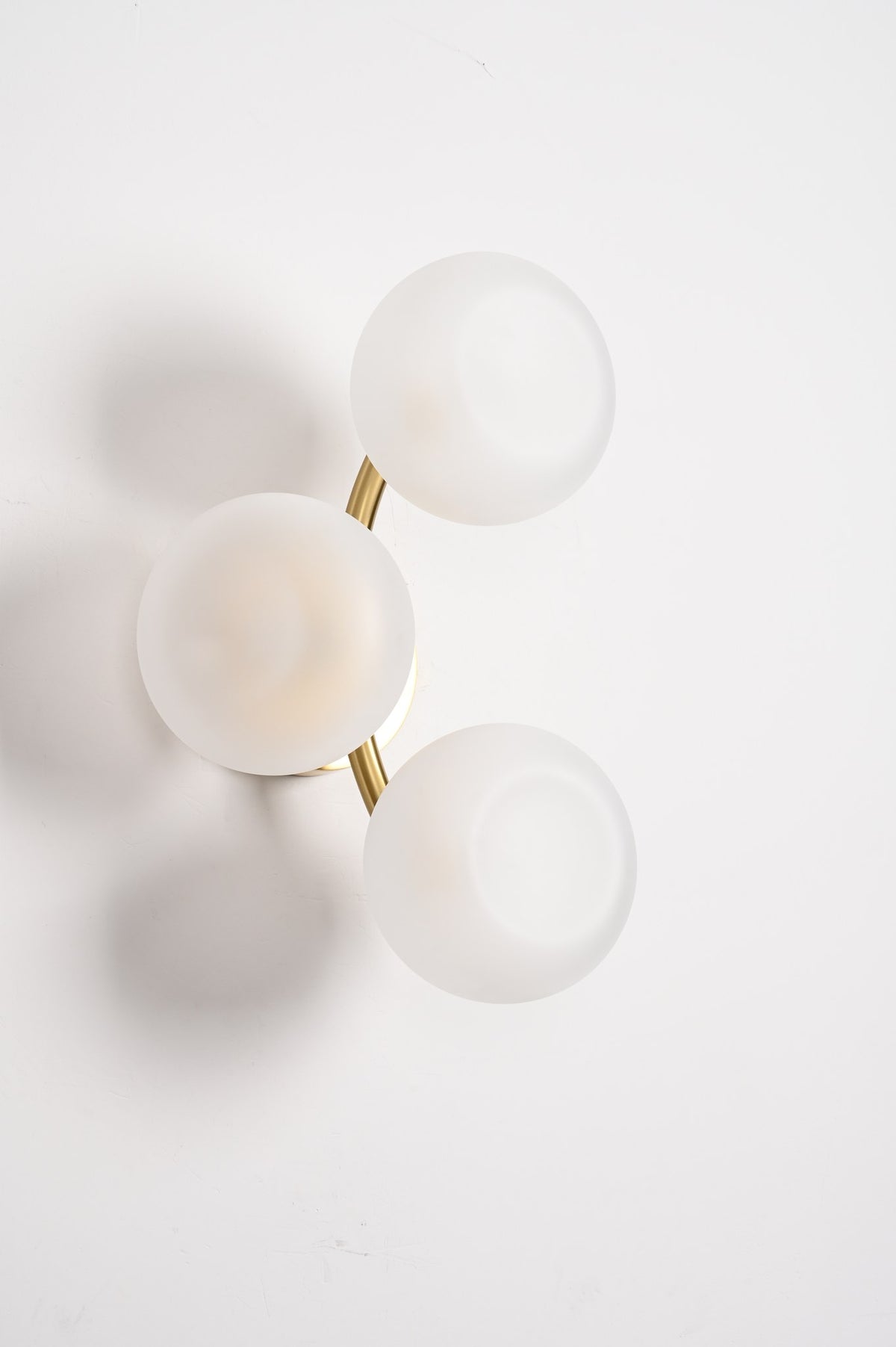 Modern Glass Globe Branch Wall Sconce in Natural Brass - 07 07-real-shot-glass-globe-wall-sconce-side