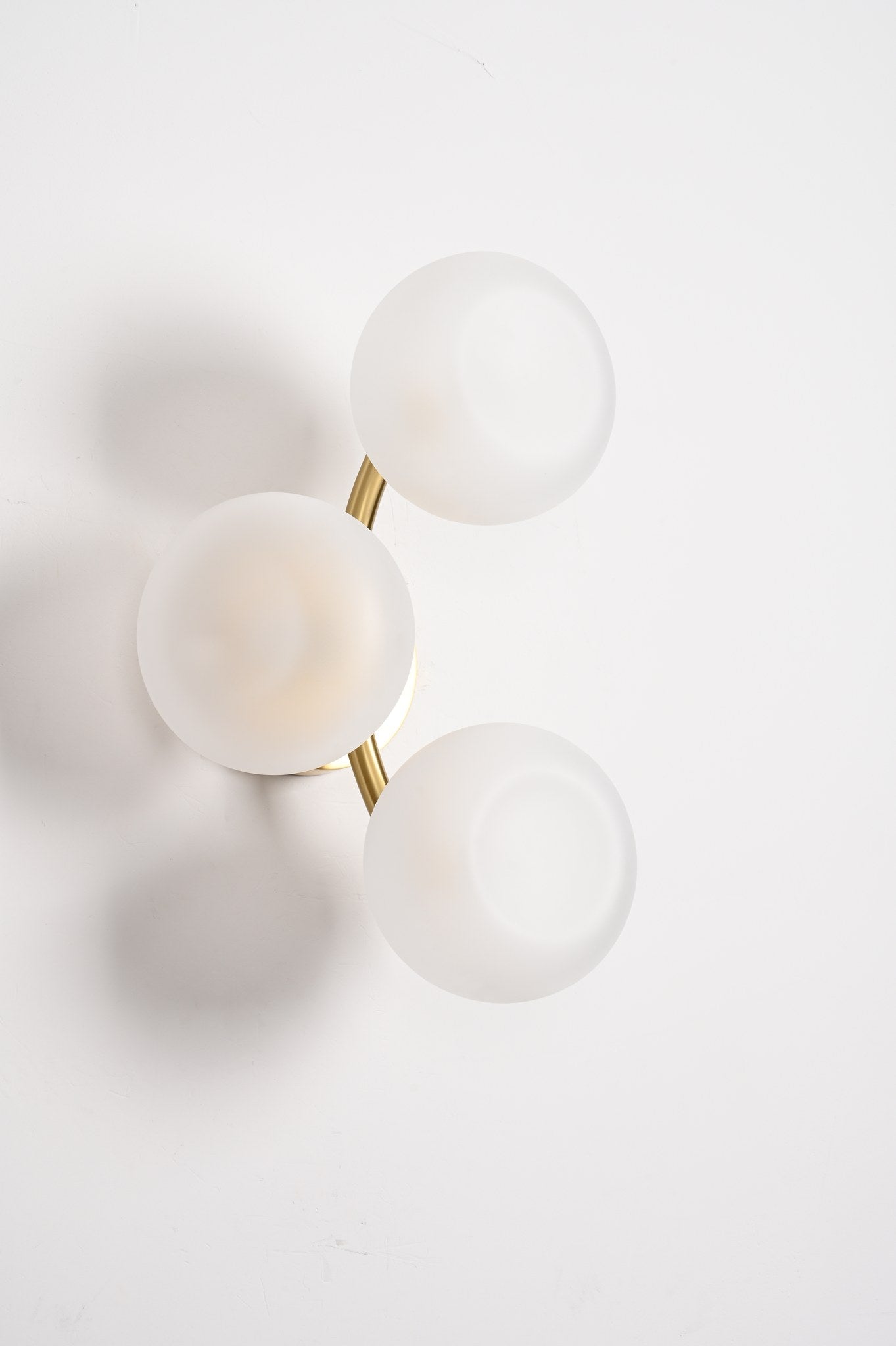 Modern Glass Globe Branch Wall Sconce in Natural Brass - 07 07-real-shot-glass-globe-wall-sconce-side