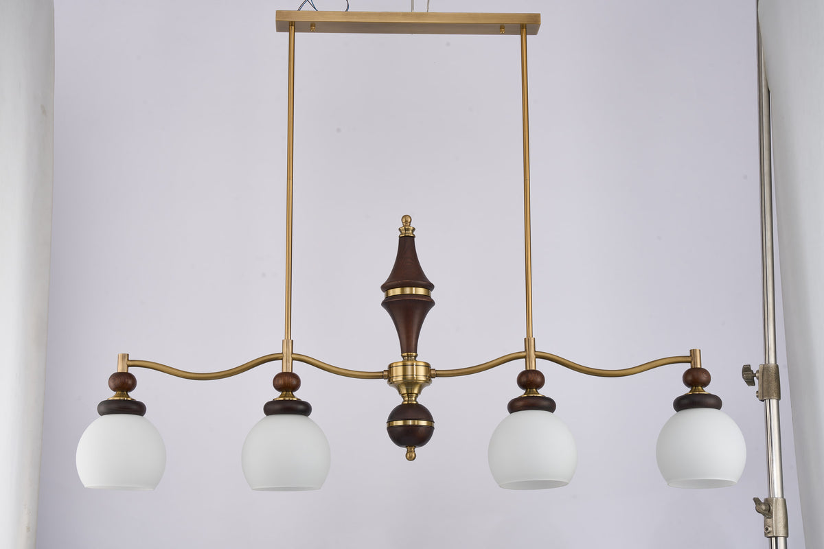 Complete supplier real photograph of the Arclorune four-light linear chandelier with rectangular canopy