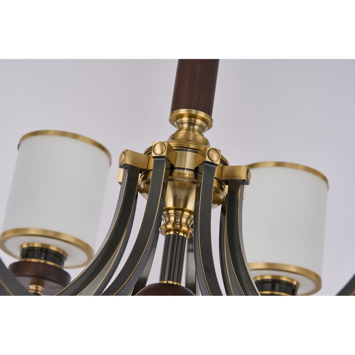 Supplier real detail photograph of the Ashbourne aged-brass hub and curved blackened arm connections