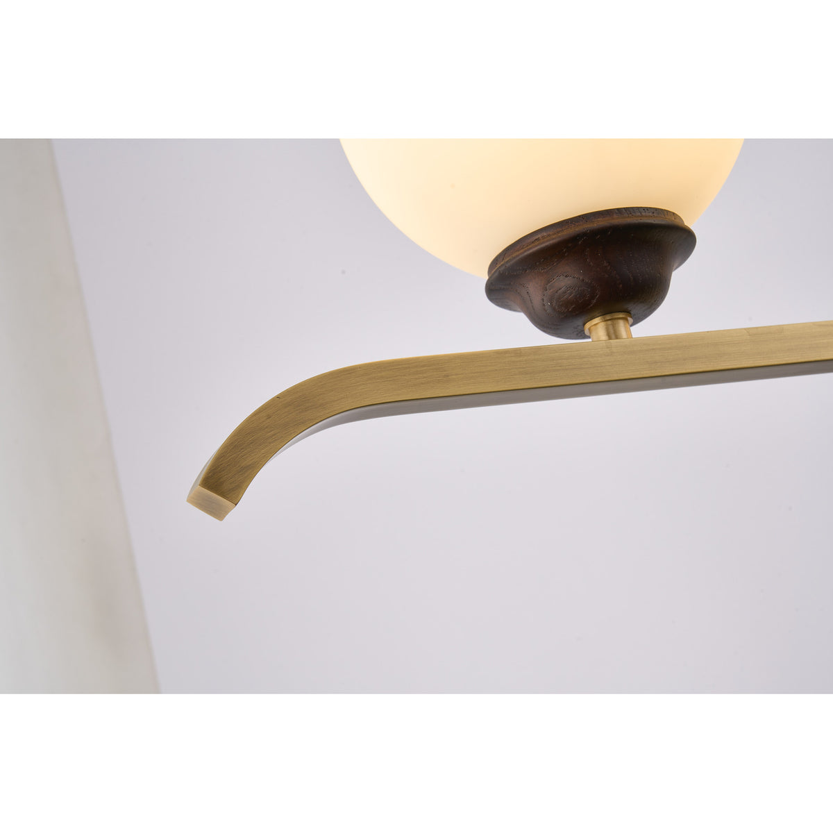 Supplier real detail photograph of the illuminated Avelune opal globe and copper bar