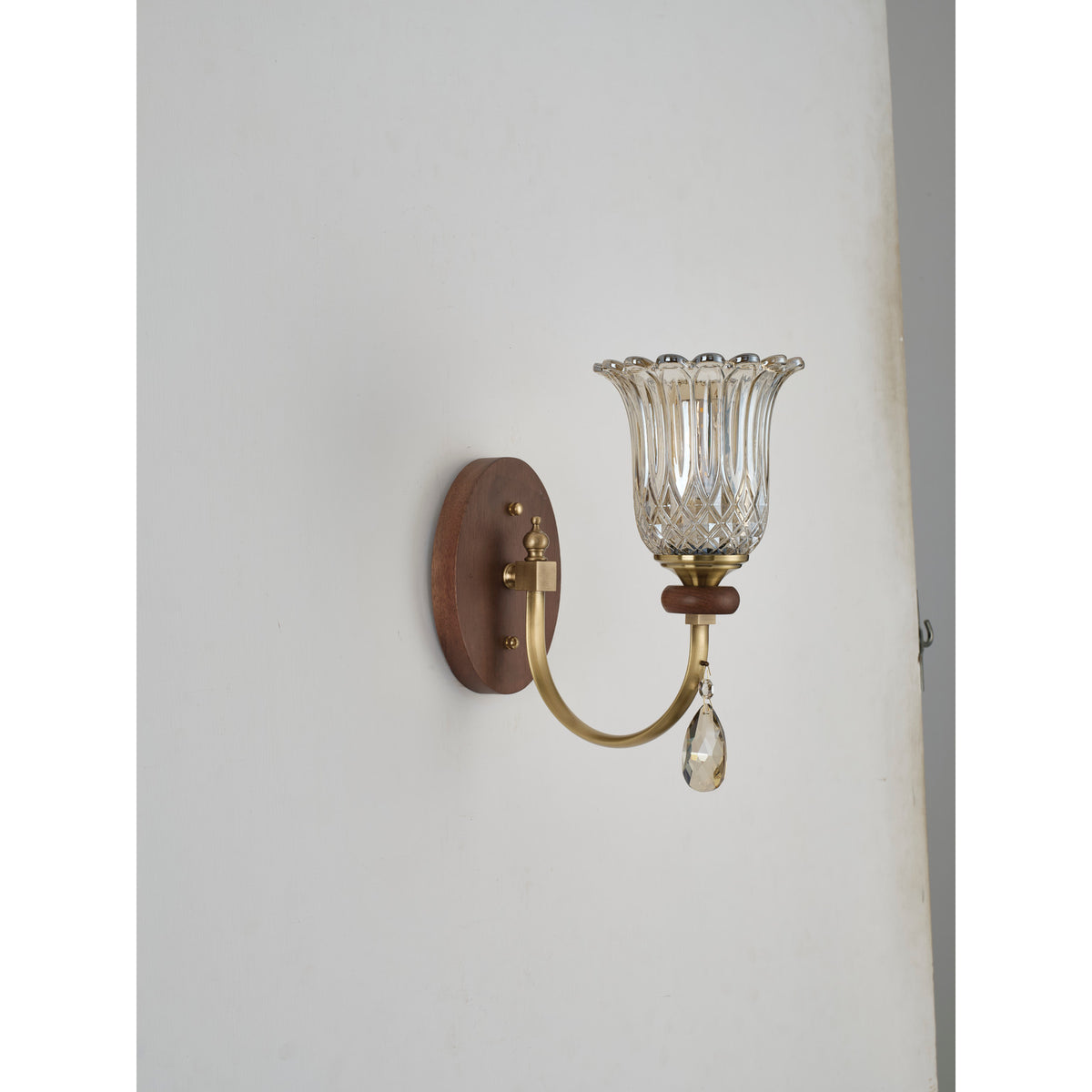 Supplier real three-quarter product photograph of the wall sconce unlit