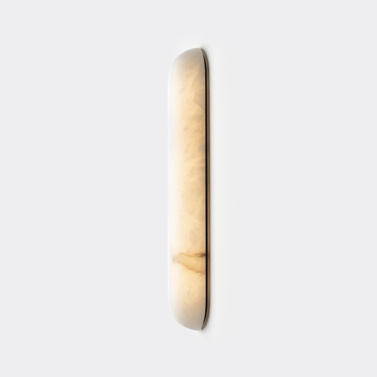 Real small alabaster capsule wall sconce side view