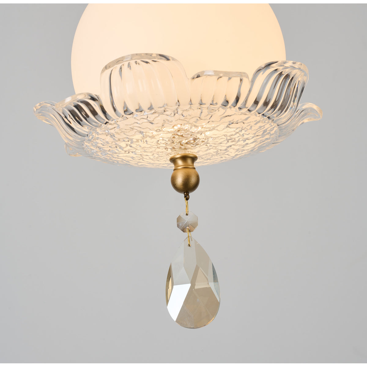 Supplier real detail photograph of Arabelle Pendant A ruffled glass and crystal detail