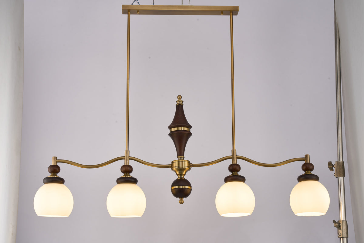 Supplier real illuminated overall view of the complete Arclorune four-light linear chandelier
