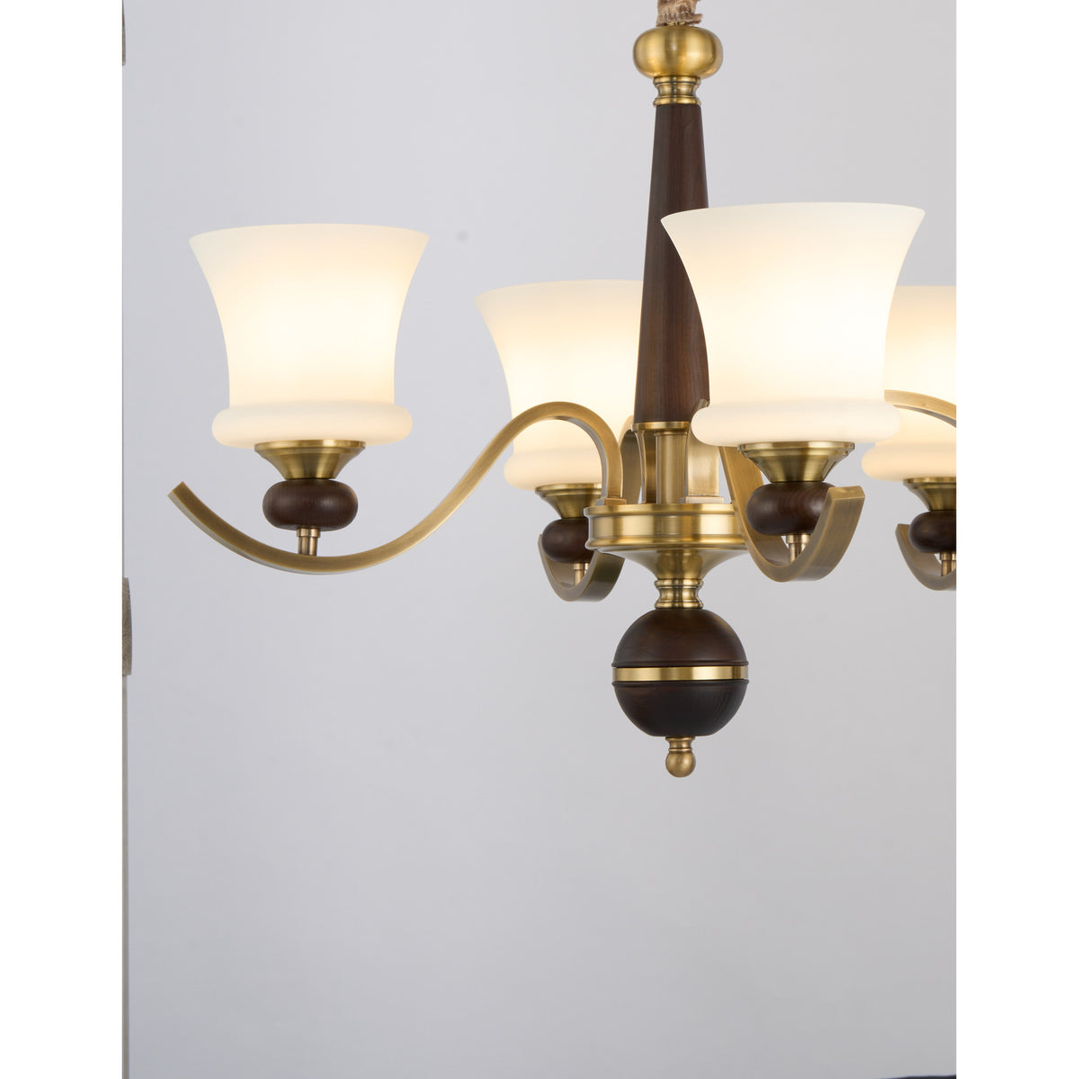 Supplier real detail crop of Brontelle opal glass shades, ash-wood collars and curved arms