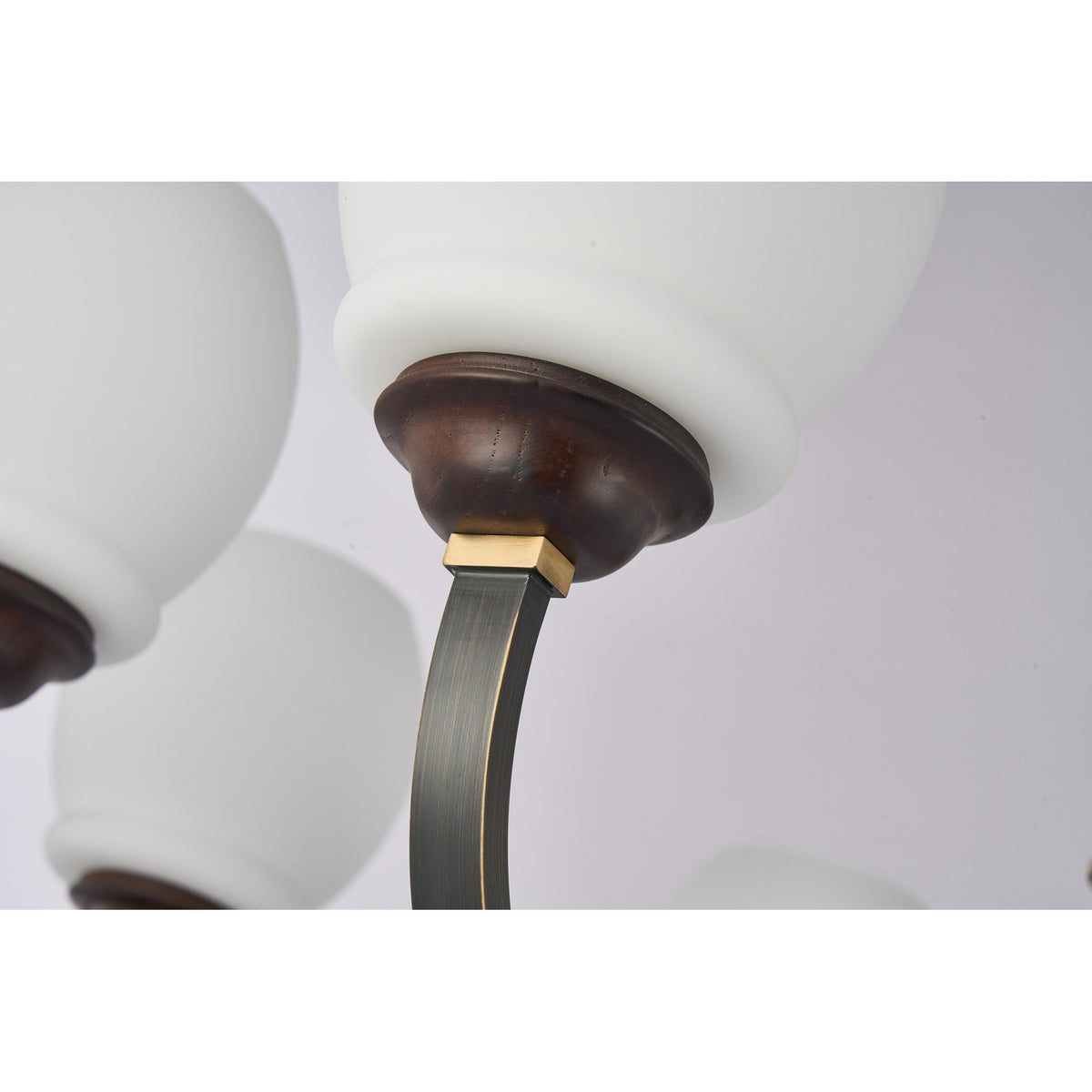 Supplier real detail photograph of the Caldwell opal shade, dark ash-wood cup and squared brass connector