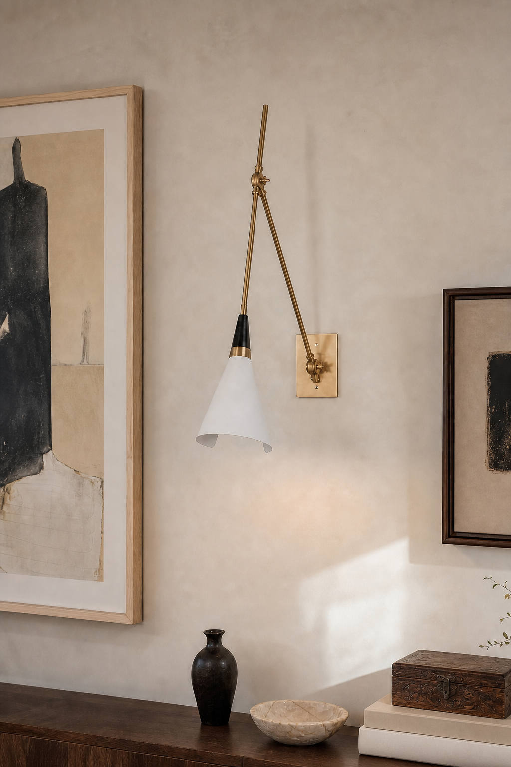 Adjustable Brass Wall Sconce — Long Arm sconce on a daylight gallery wall