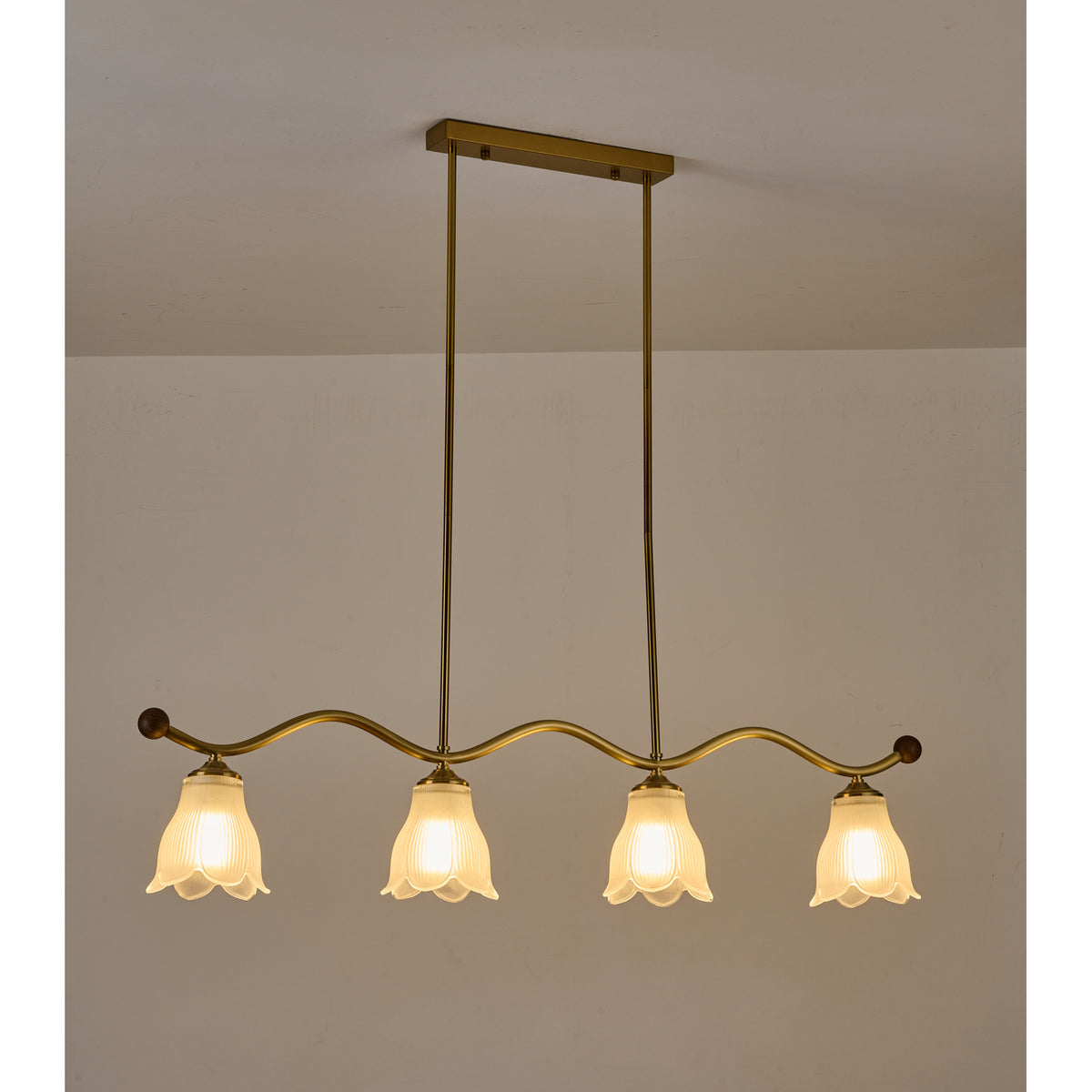 Supplier real angled product photograph of the linear chandelier unlit