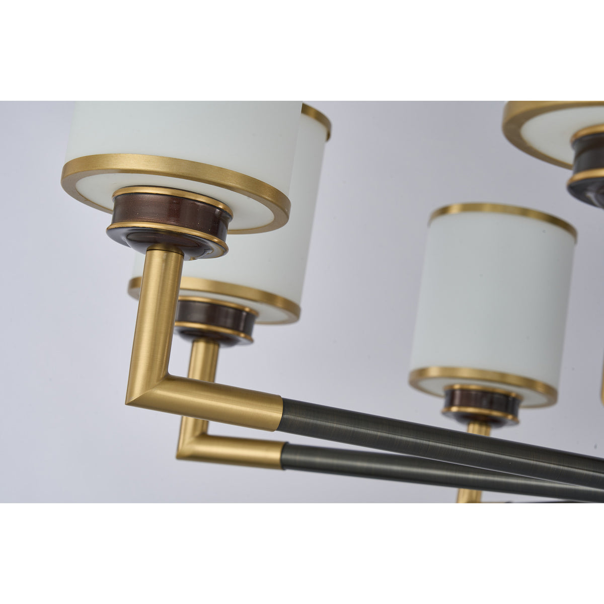 Supplier real detail photograph of the Orseline black rail and antique-gold arm
