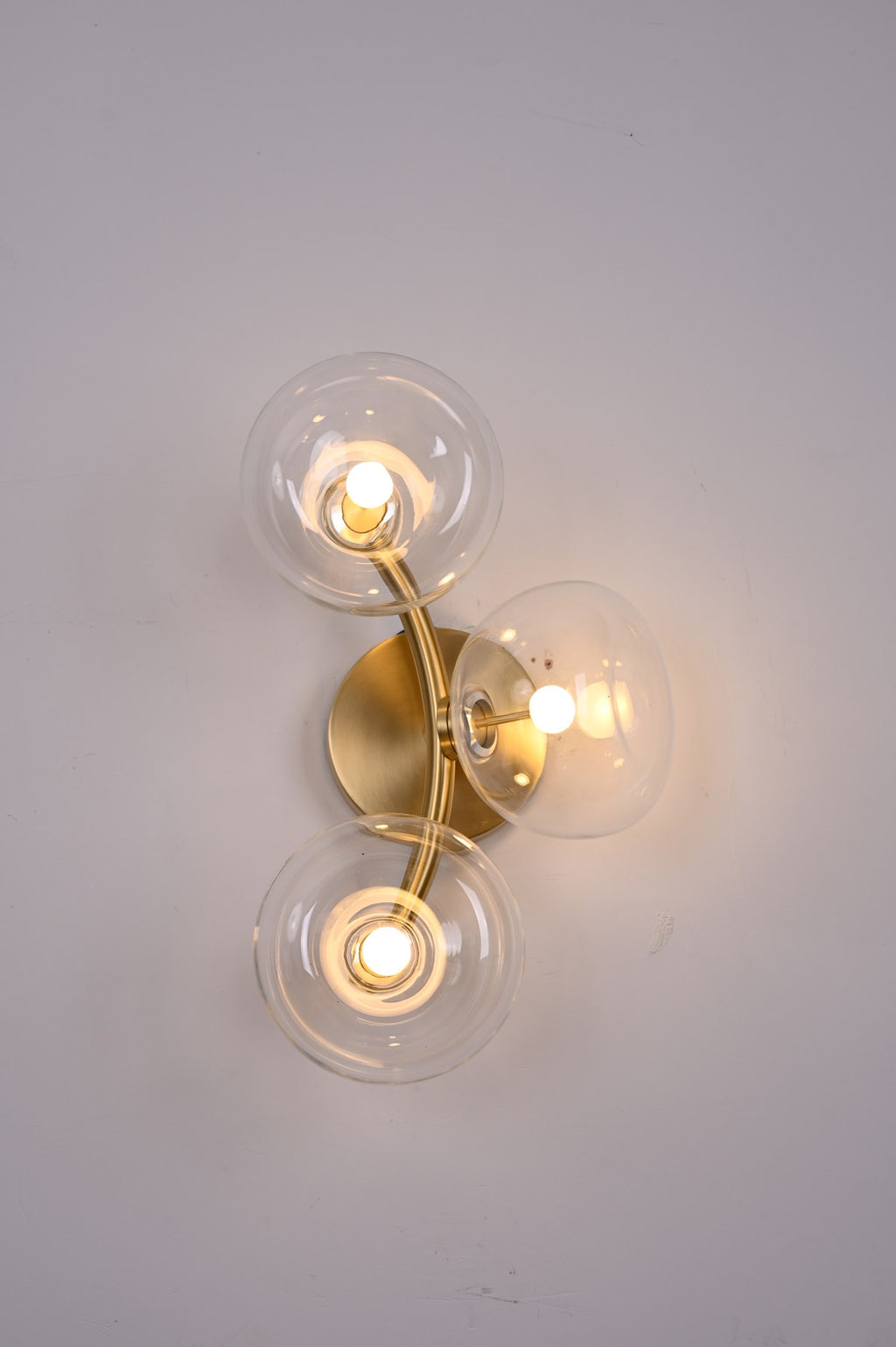 Modern Glass Globe Branch Wall Sconce in Natural Brass - 09 09-real-shot-glass-globe-wall-sconce-detail