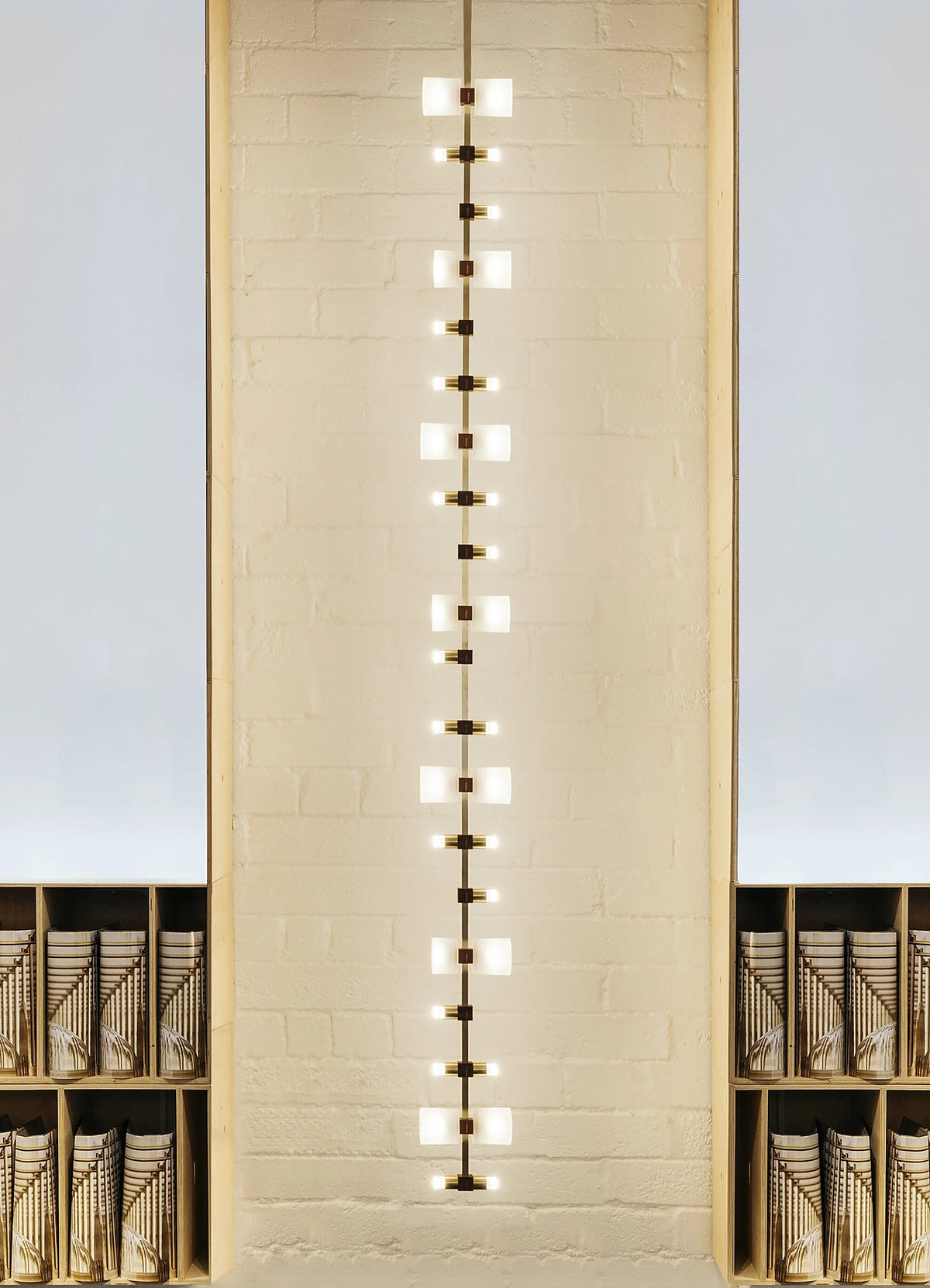 Royal vertical pendant in a tall architectural opening with full suspension visible