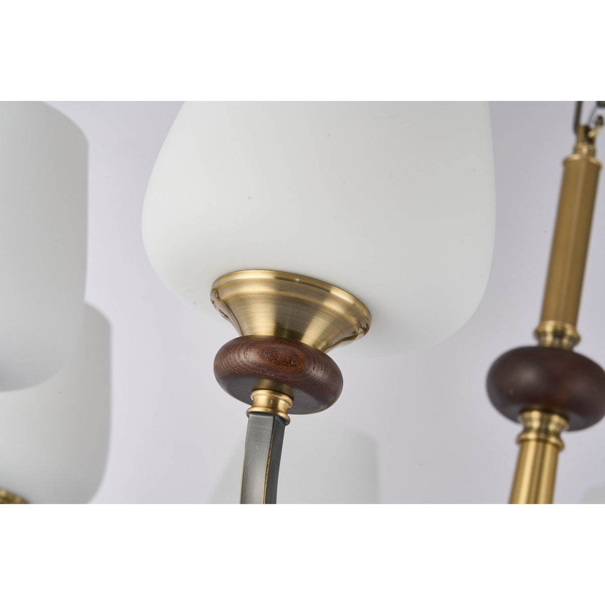 Supplier real detail photograph of the Wetherby tapered opal glass shade, wood collar and antique-brass socket cup