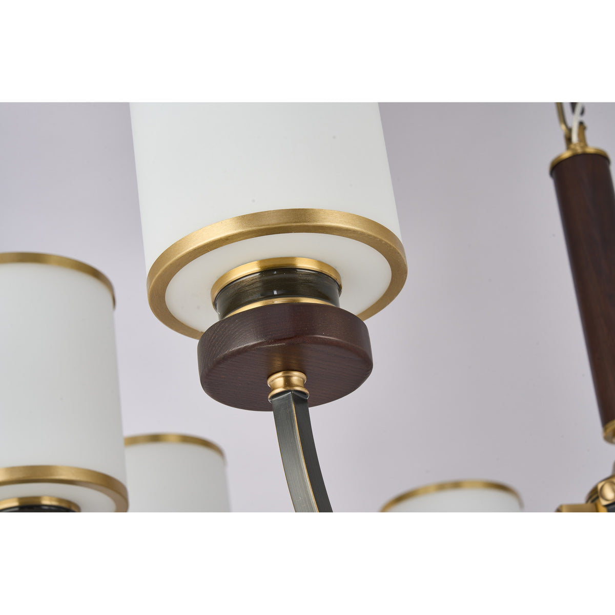 Supplier real detail photograph of the Ashbourne opal glass shade, brass rim and dark ash-wood collar