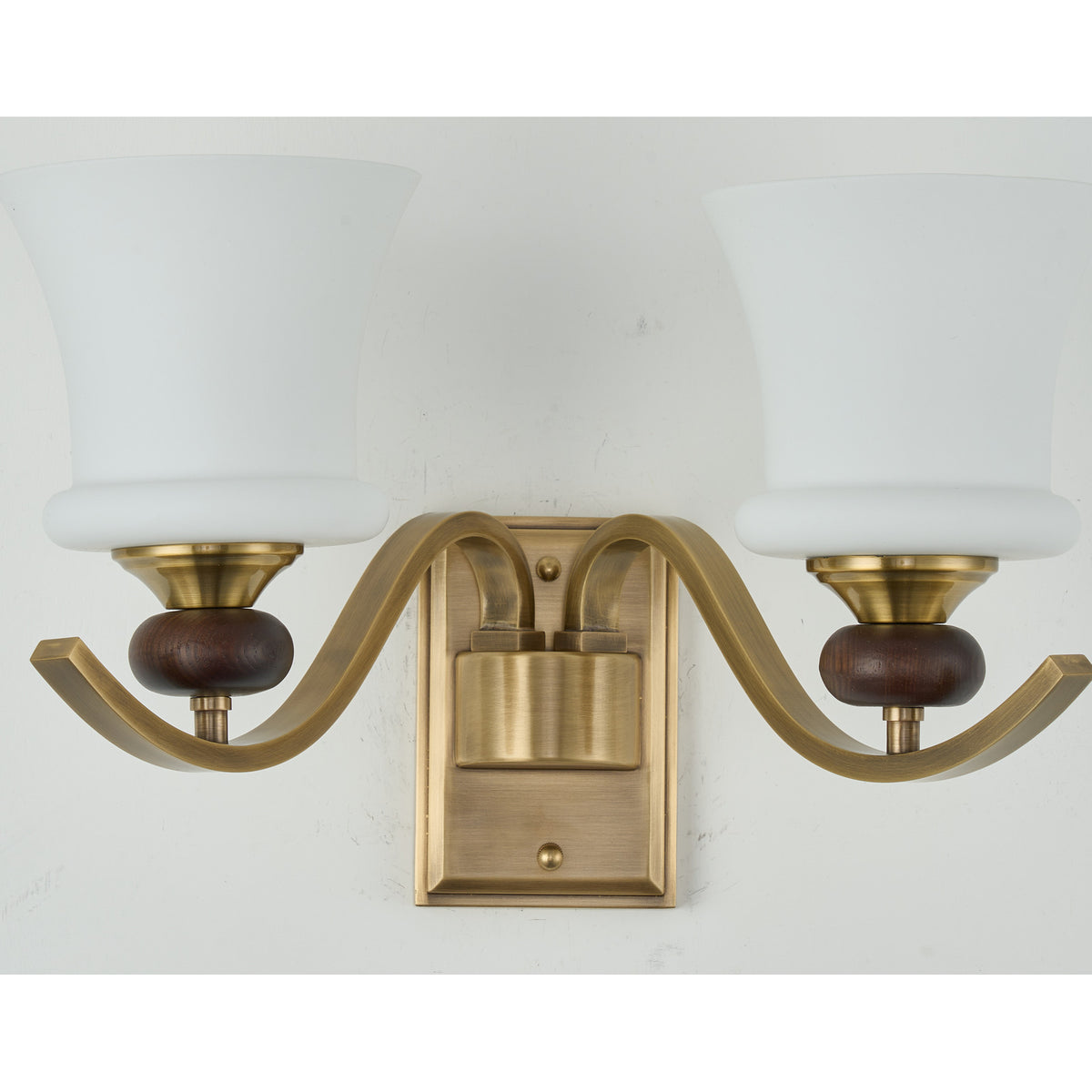 Supplier real detail crop of the Brontelle two-light stepped wall plate and twin arms