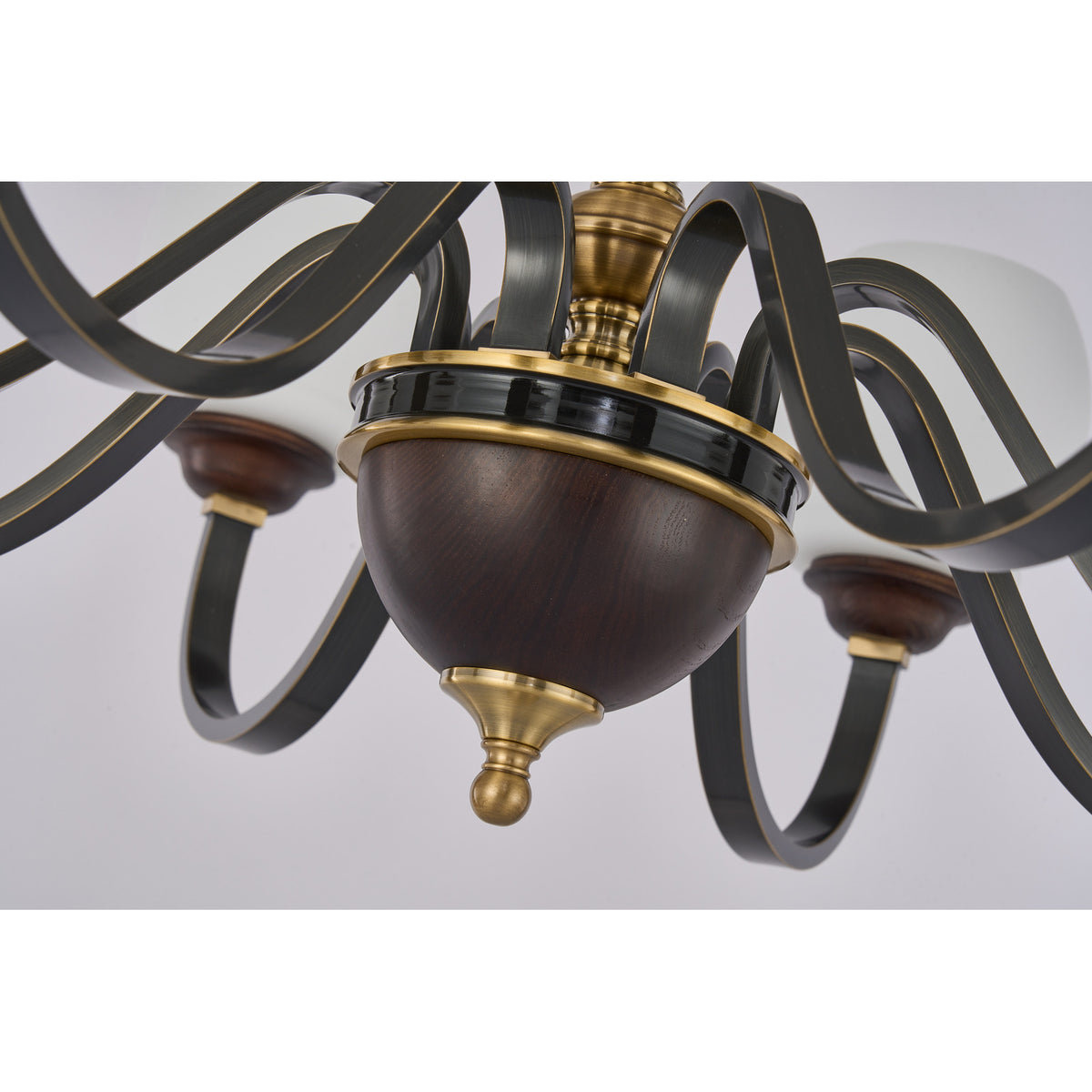 Supplier real detail photograph of the Caldwell dark wood lower bowl, brass rings and finial