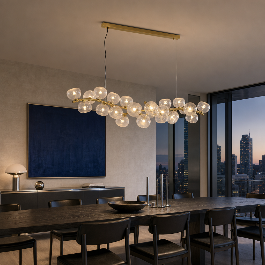 Clear glass 26-light linear chandelier illuminated in a contemporary penthouse dining room
