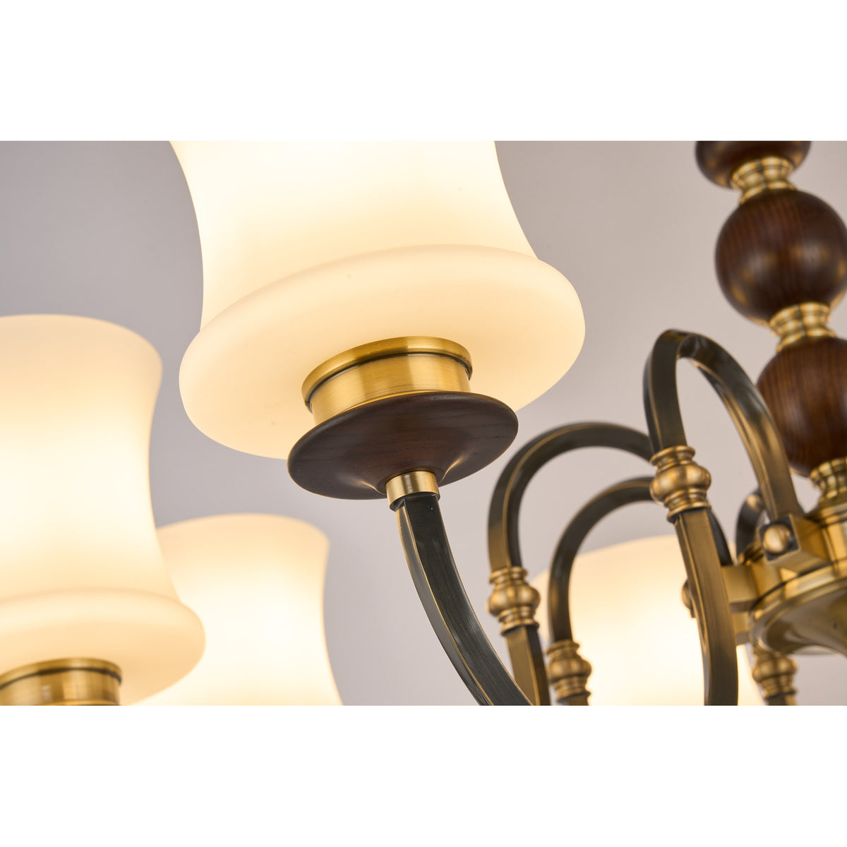 Supplier real detail photograph of the Ebonelle flared opal shade and antique brass collar