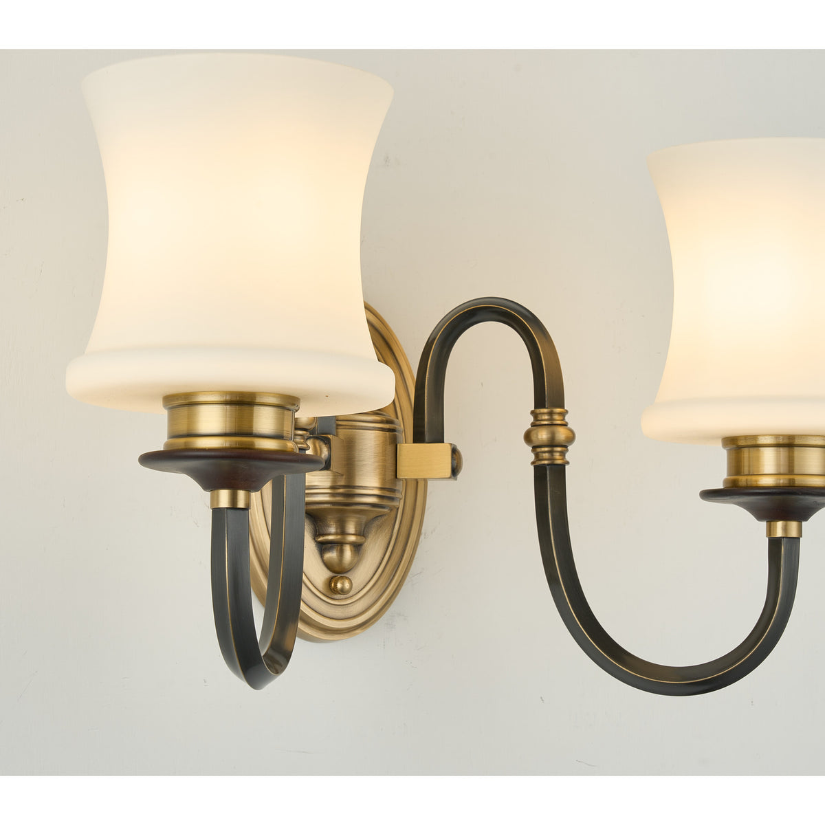 Supplier real detail crop of the Ebonelle two-light stepped wall plate and twin arms