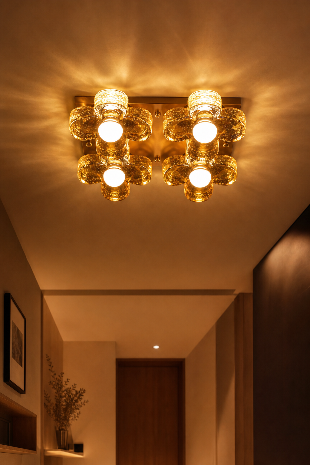 4-Light Amber Glass Flush Mount Ceiling Light illuminated in a warm evening interior