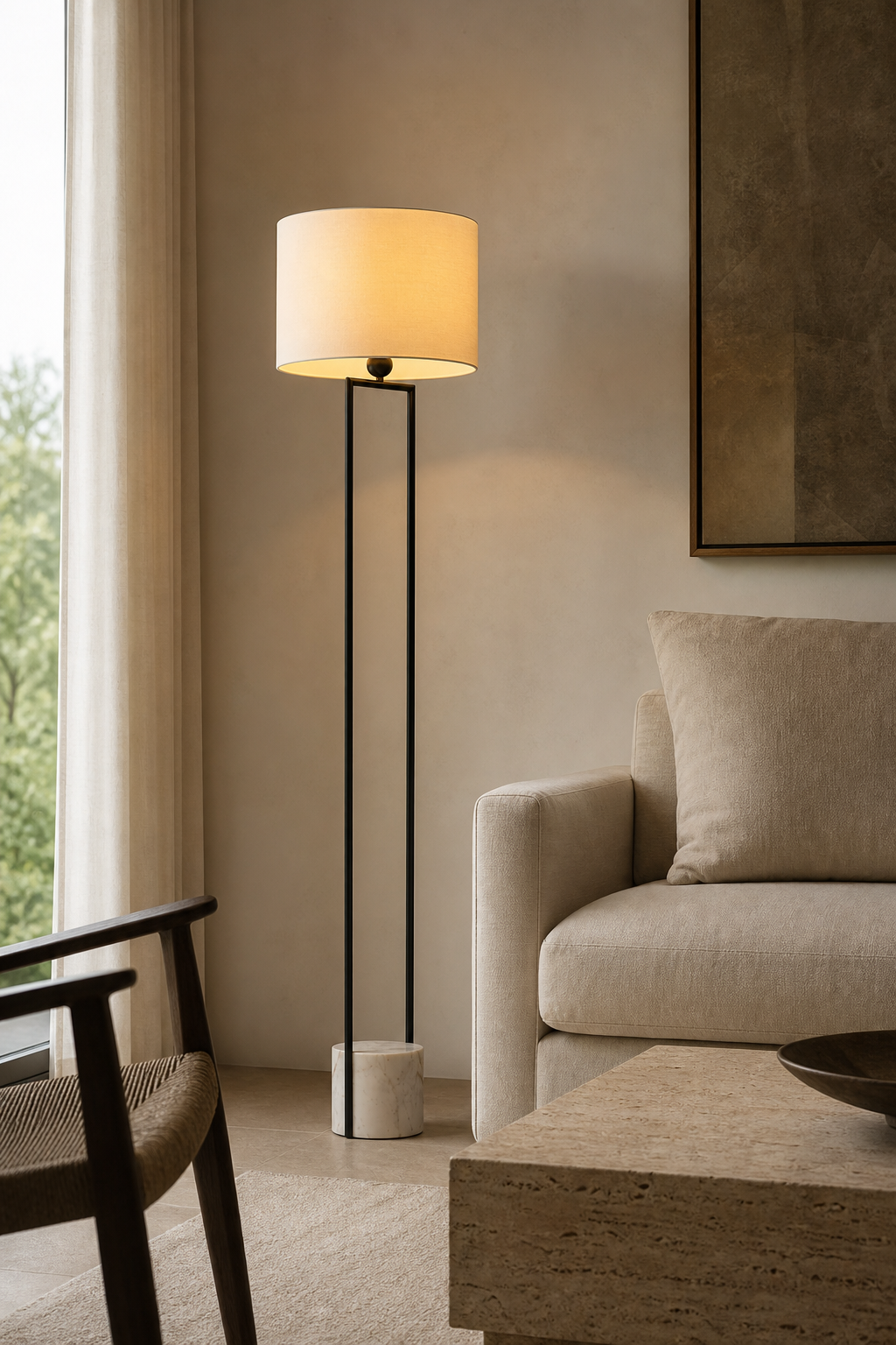 Double-Rod Marble Base Floor Lamp in black illuminated in a warm evening interior