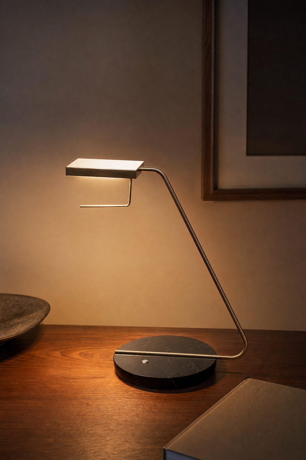Antique Brass Marble LED Table Lamp illuminated in a warm evening interior
