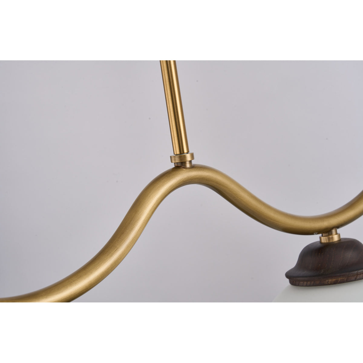 Supplier real detail photograph of the Ondervale undulating copper arm and shade connection