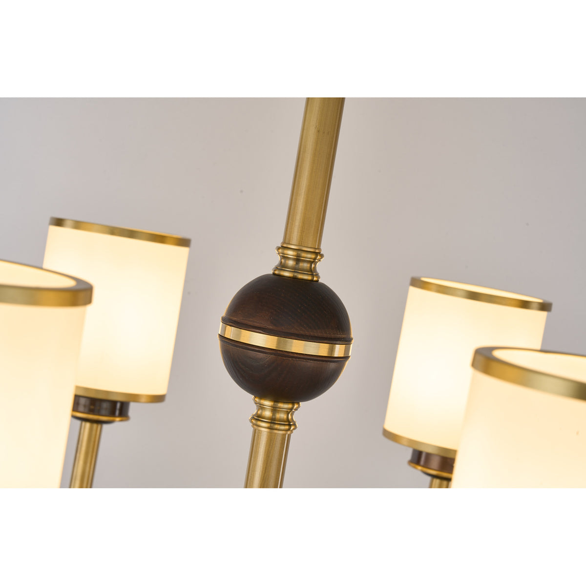 Supplier real detail photograph of the Orseline dark ash-wood sphere and brass stem