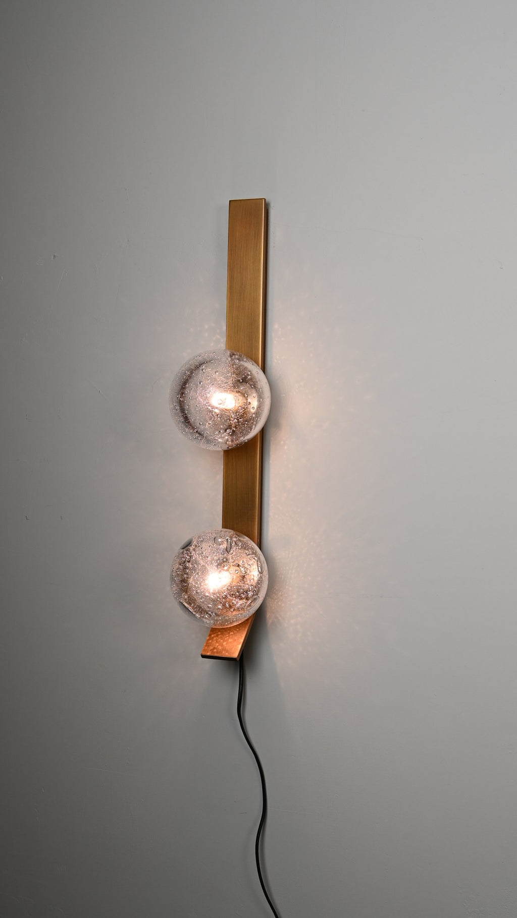 Modern Glass Globe Wall Sconce in Antique Brass - 10 10-real-shot-glass-globe-wall-sconce-room-view