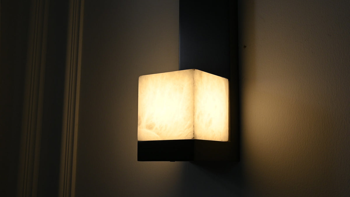Modern Snowflake Alabaster Wall Sconce in Brushed Black - 10 10-real-shot-video-frame-detail