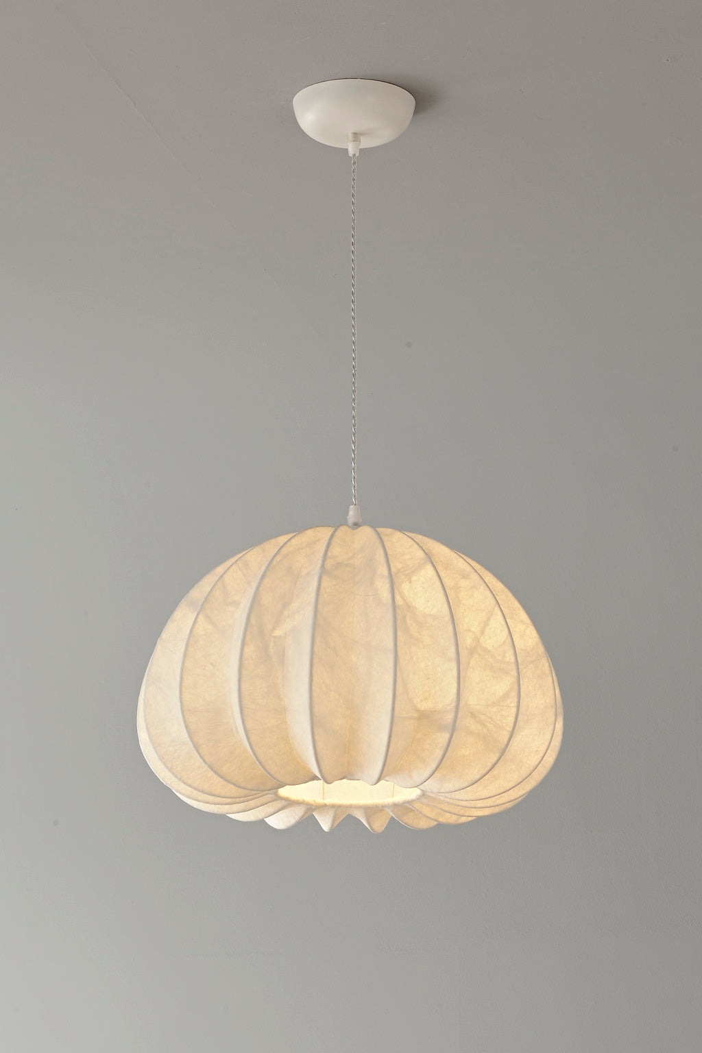 Aeriwisp ribbed silk pendant real angled view illuminated