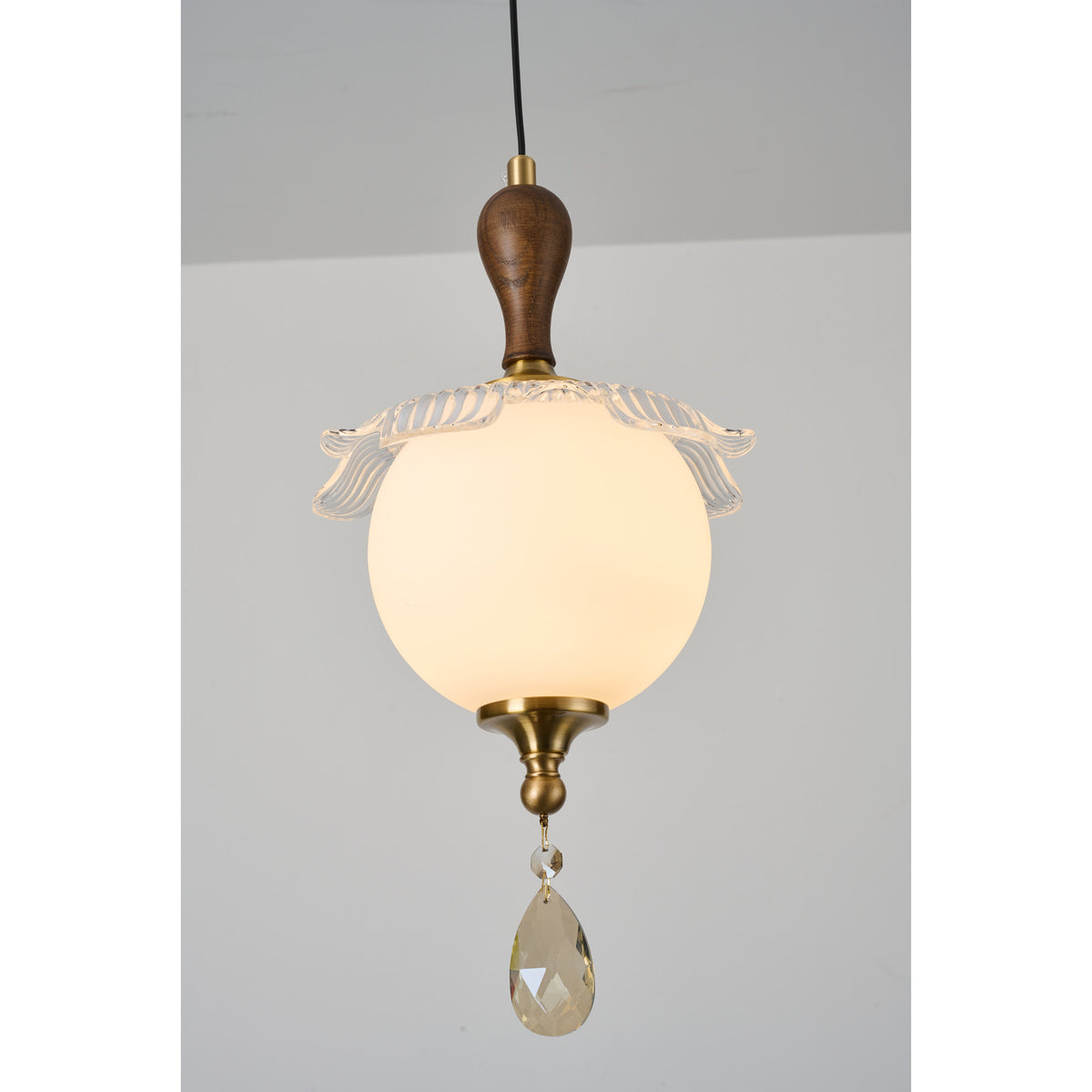 Supplier real detail photograph of Arabelle Pendant B globe and ruffled crown detail lit