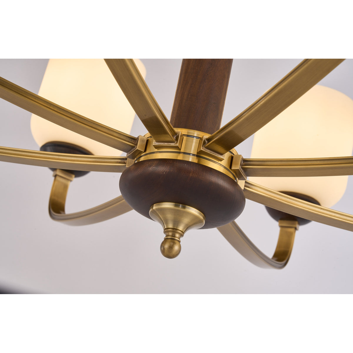 Supplier real detail photograph of the Bellgrave lower hub, radial arm joints and brass finial