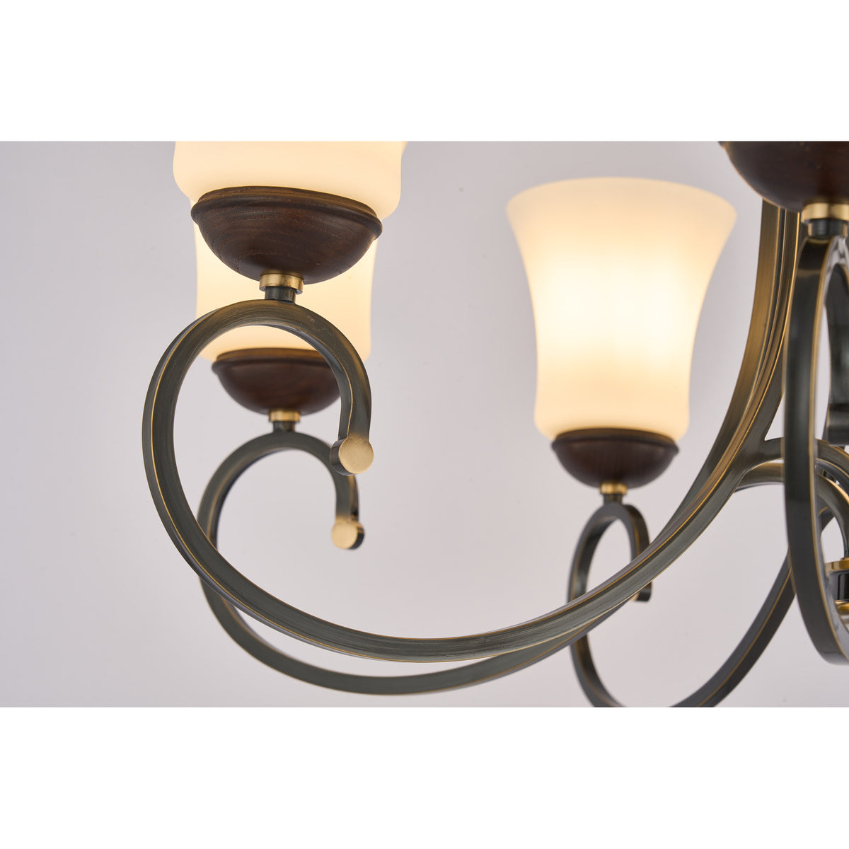 Supplier real detail photograph of the Haverford blackened looping arm and small brass tip