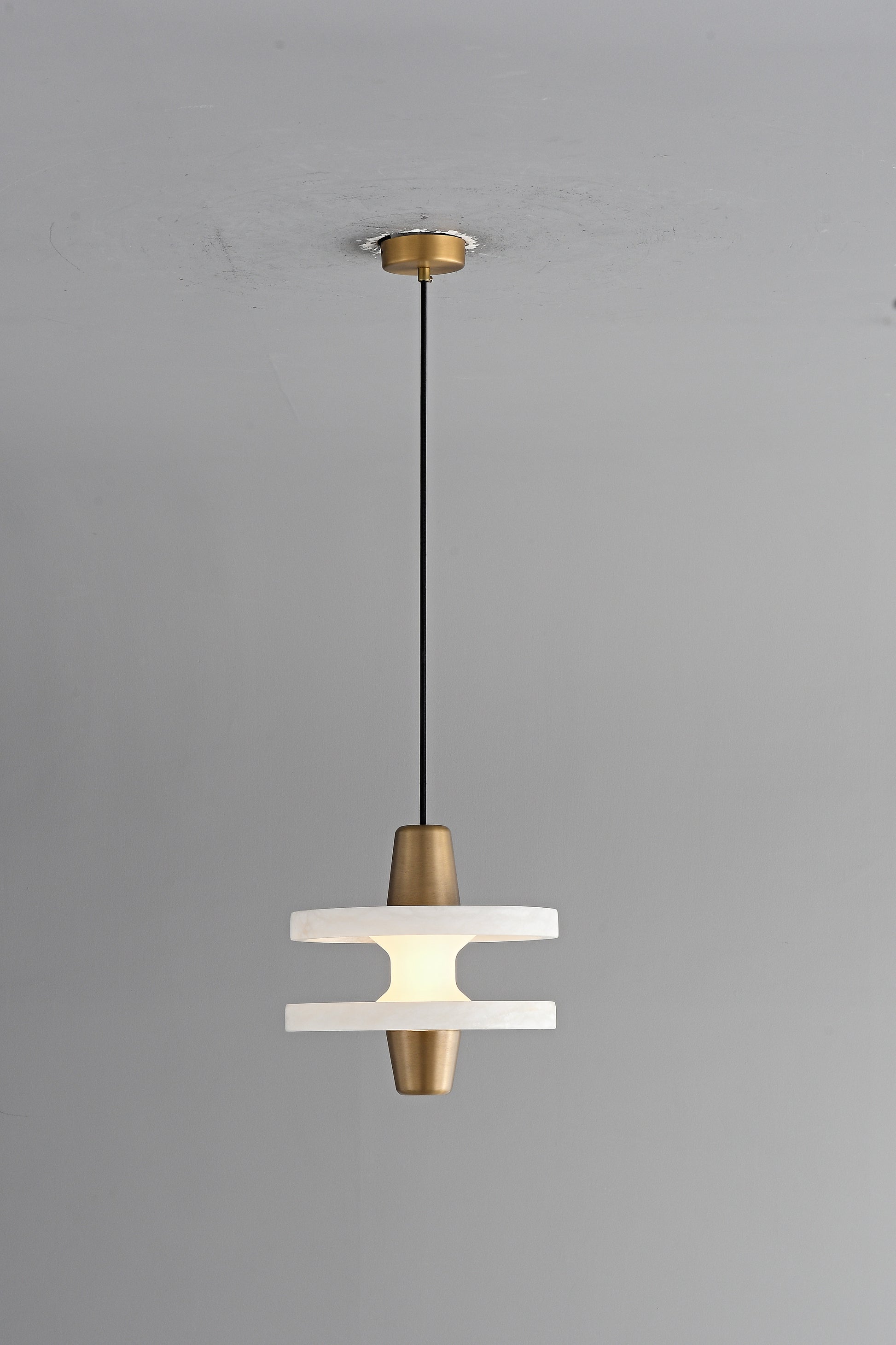 Modern Alabaster Disc Pendant Light - 11 11-real-hanging-room