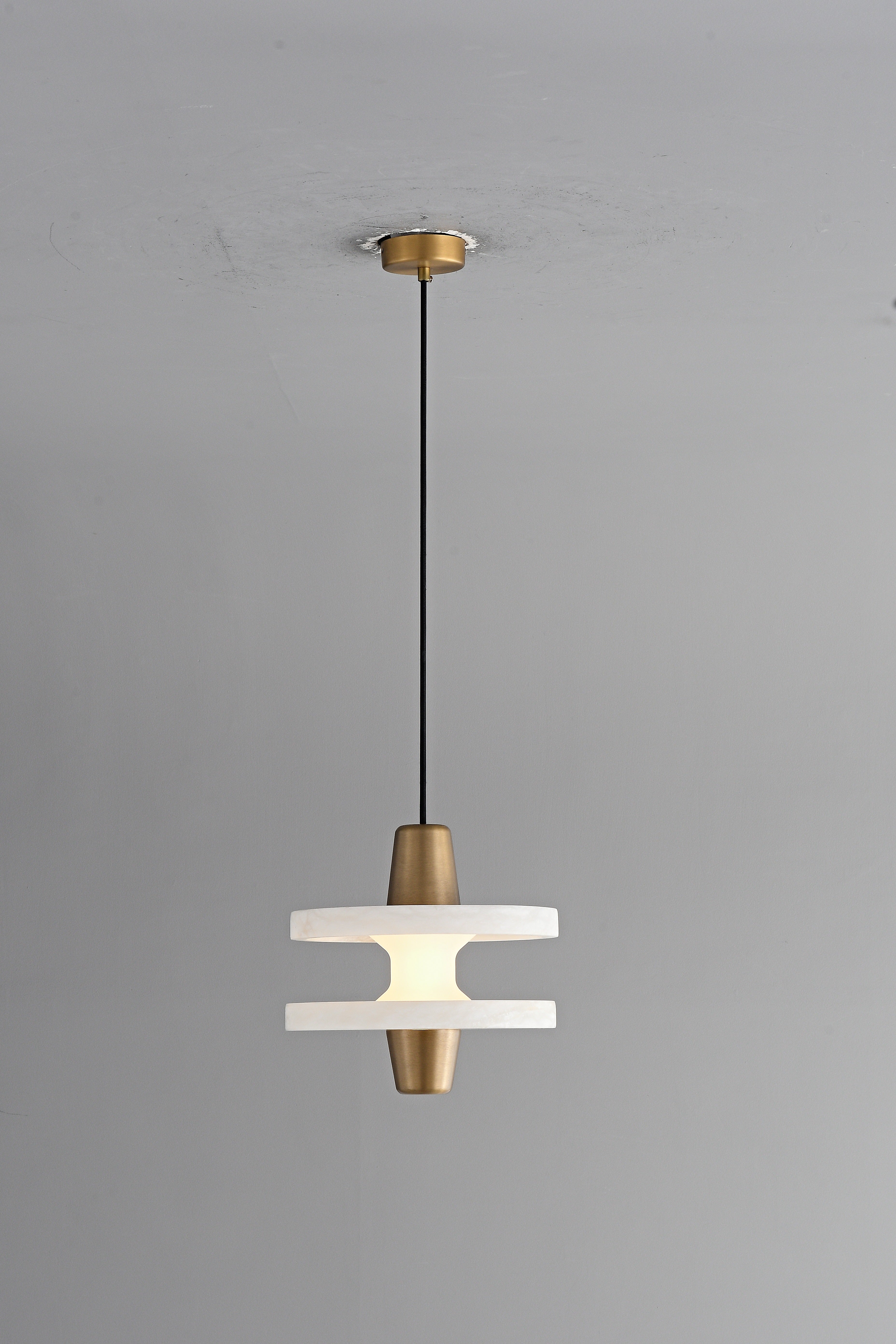 Modern Alabaster Disc Pendant Light - 11 11-real-hanging-room
