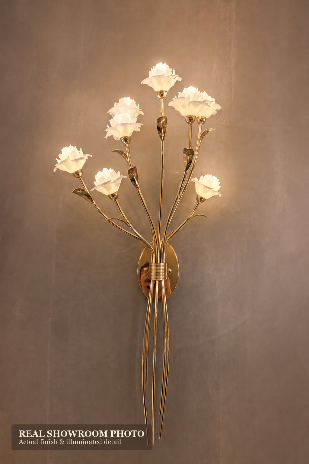 Sylverelle wall sconce – phone-shot showroom view of tall floral wall sconce