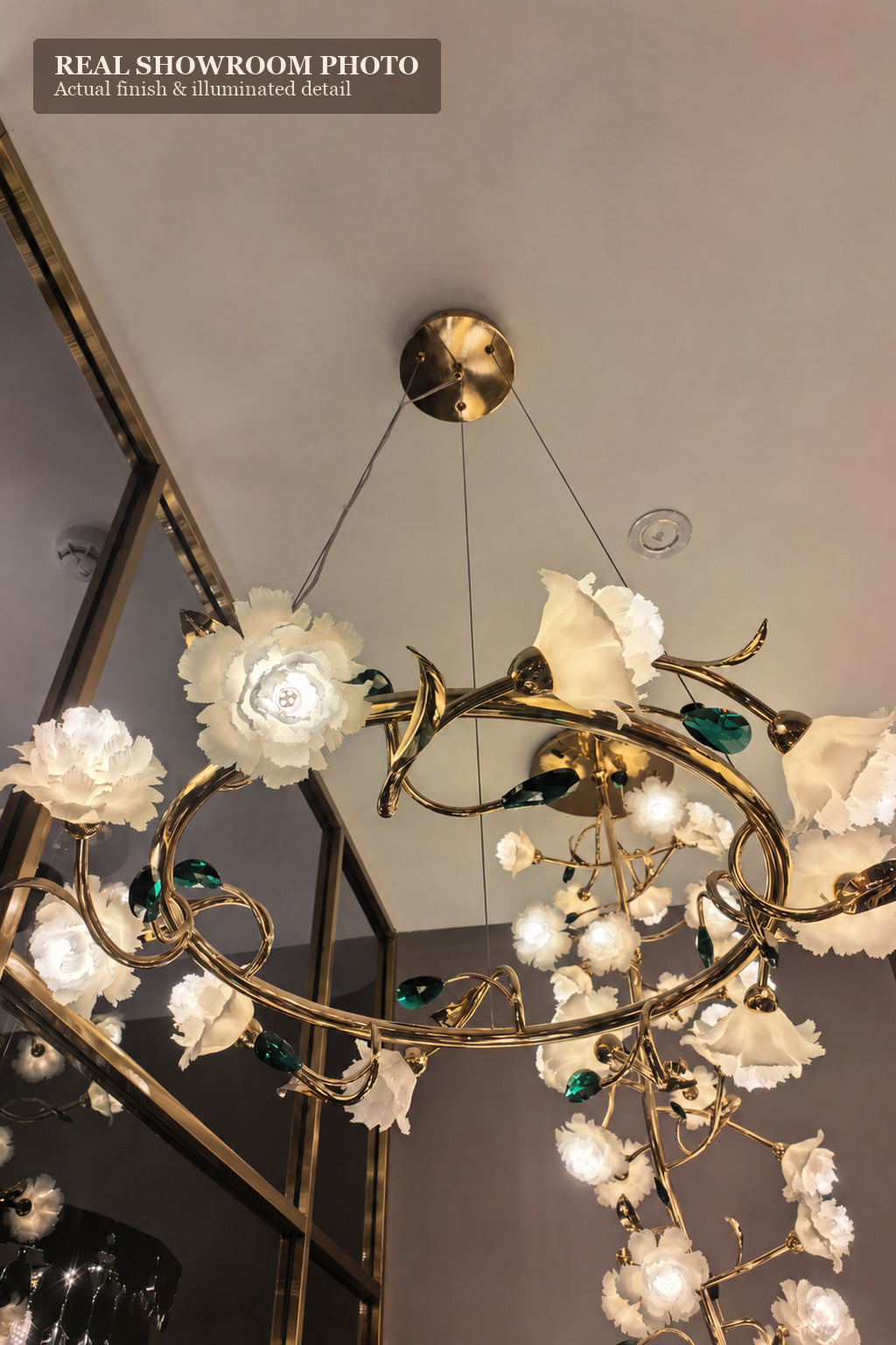Sylverelle chandelier – low-angle phone-shot view of floral ring chandelier and ceiling canopy