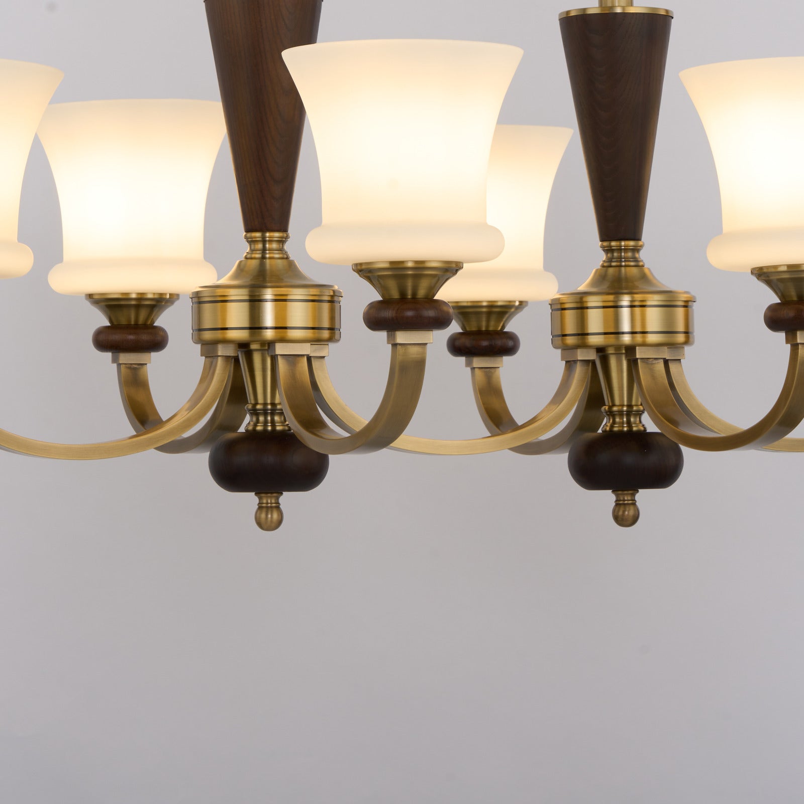 Caldrienne linear chandelier joined copper hub detail