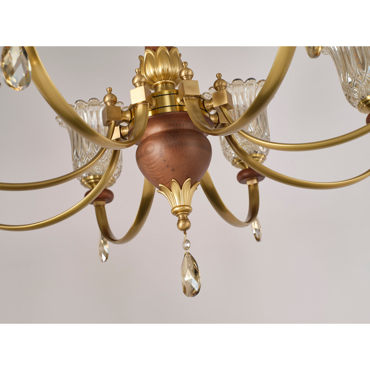 Supplier real chandelier detail showing the ash-wood hub and faceted crystal drop