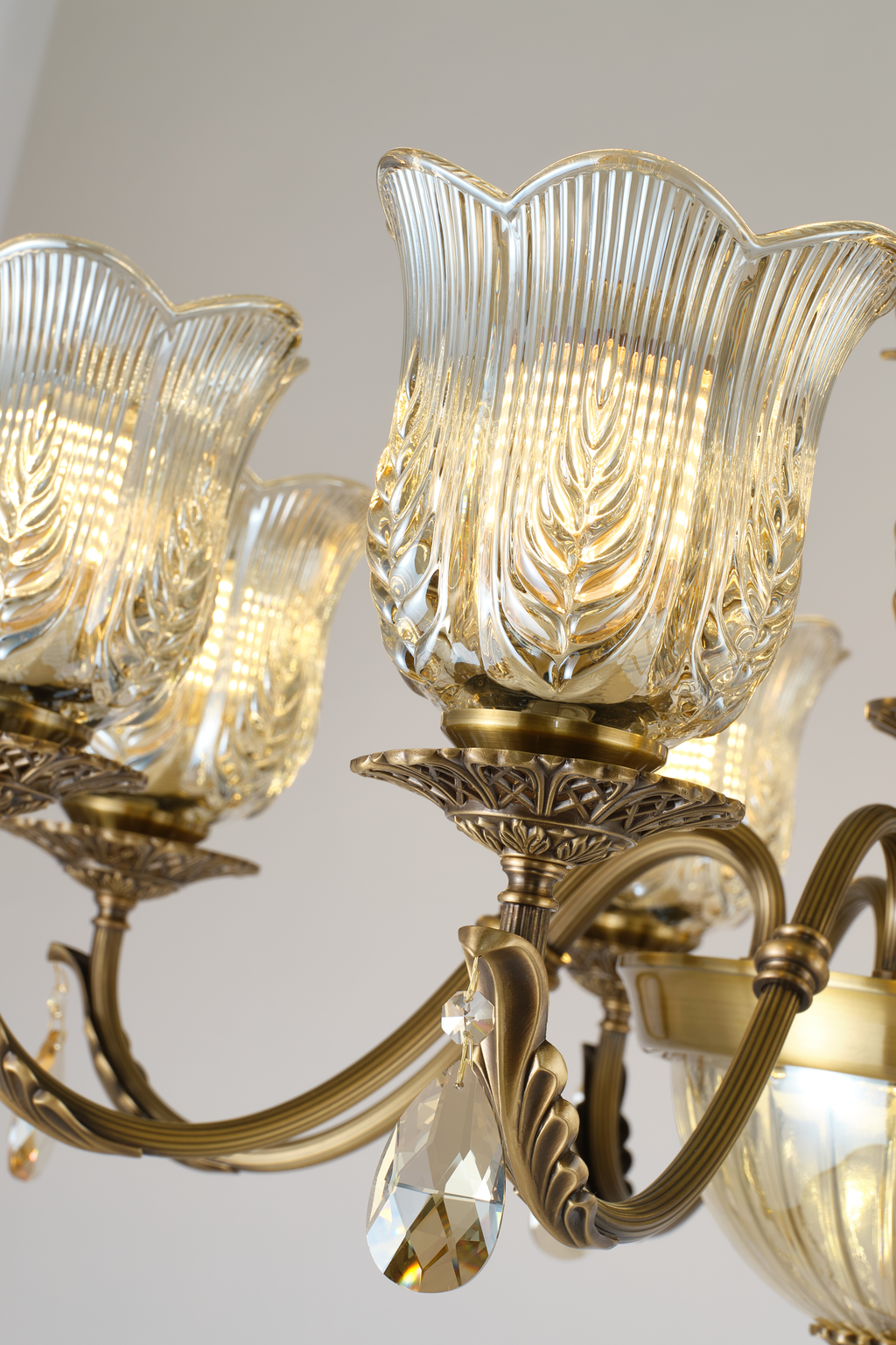 Marmavelle clear leaf-cut glass shade and antique-bronze holder detail