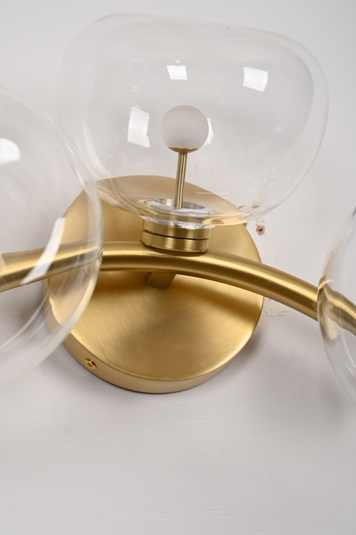 Modern Glass Globe Branch Wall Sconce in Natural Brass - 12 12-real-shot-glass-globe-wall-sconce-install-detail