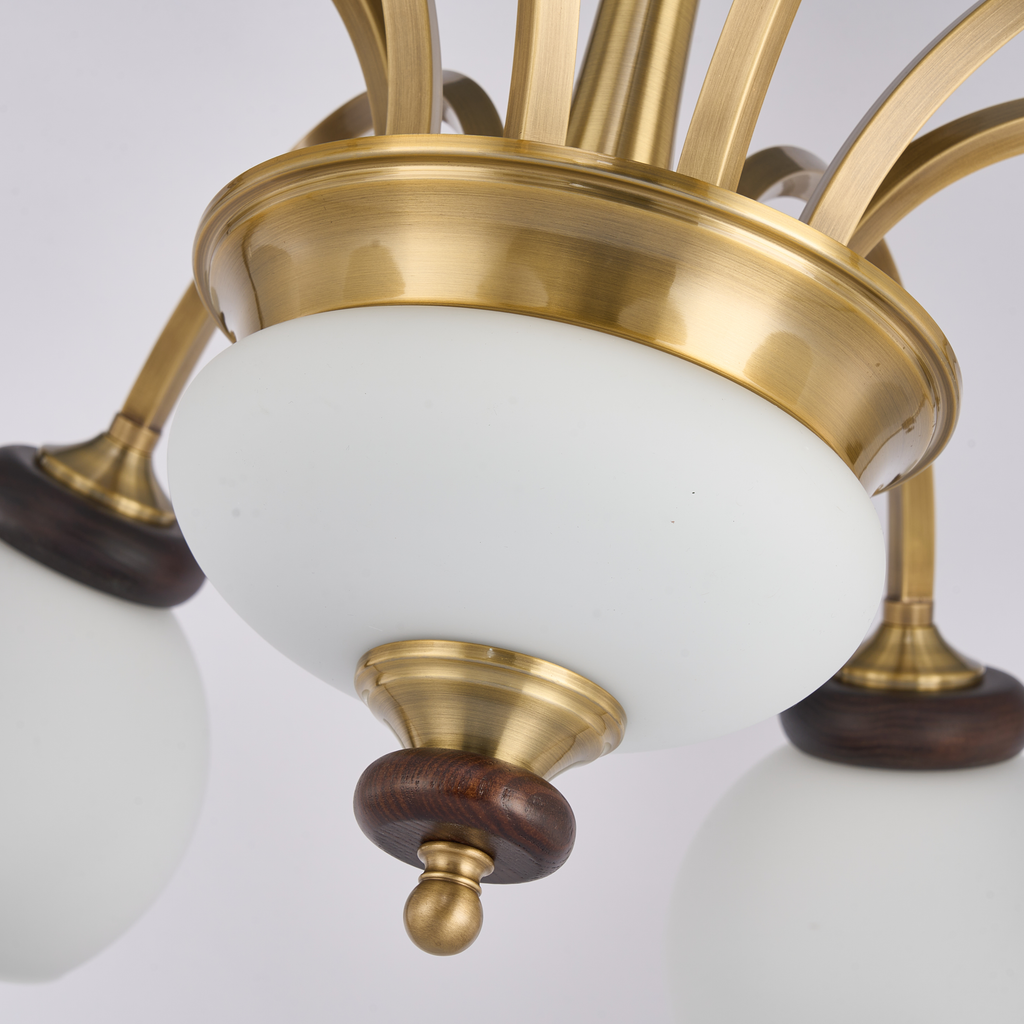 Arborenne lower milk-glass bowl, natural-copper hub and dark ash-wood finial detail